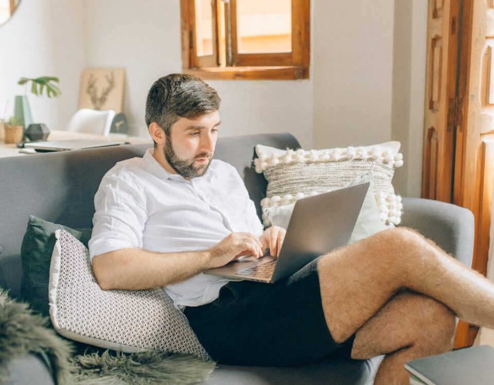 A Man Using a Laptop