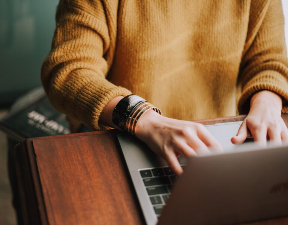 person using laptop computer